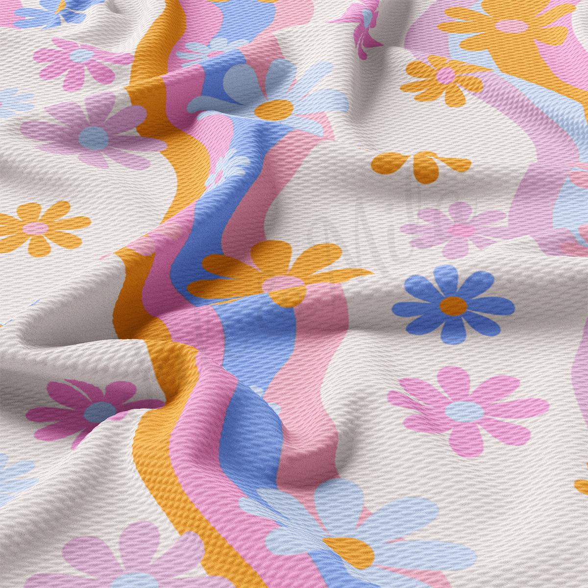 a close up of a colorful flowered fabric