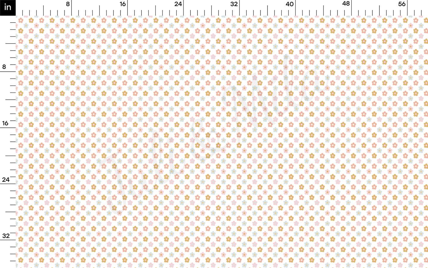 a white and orange dotted paper with a ruler