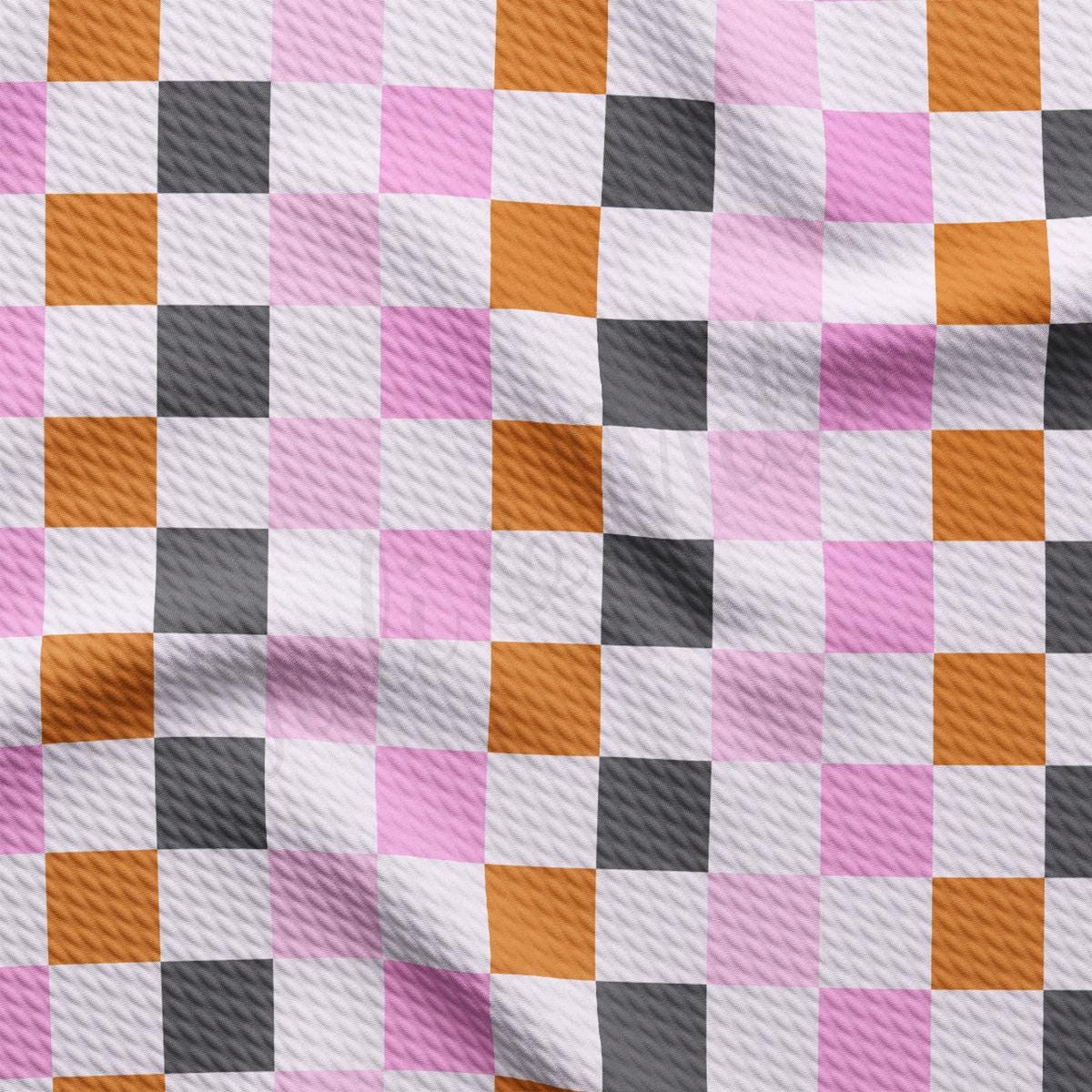 a checkered fabric with a pink and grey pattern
