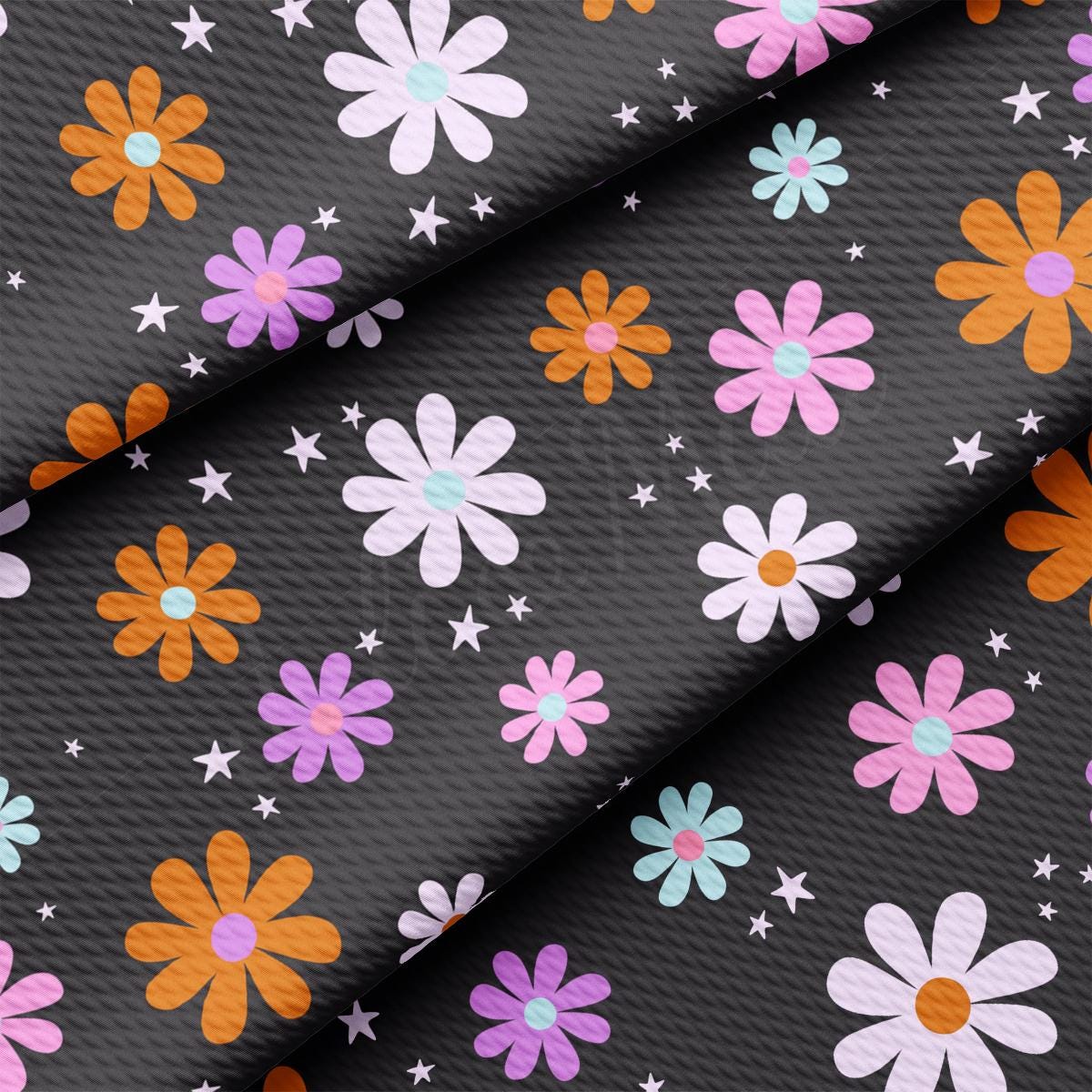 a black background with pink, orange, and blue flowers