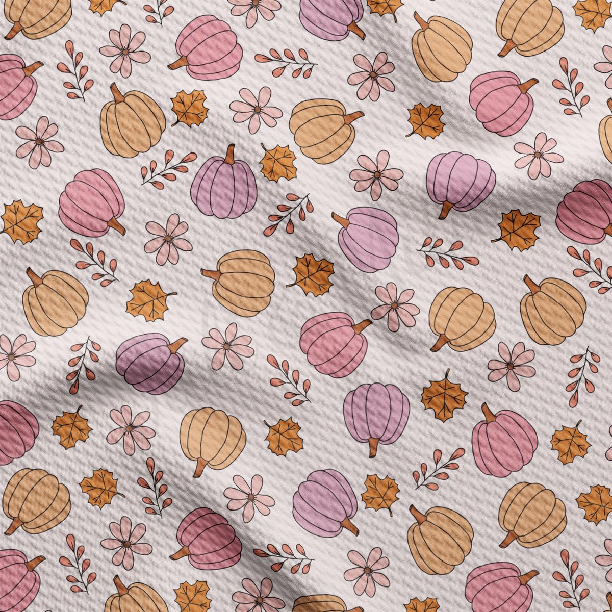 a pattern of flowers and leaves on a white background