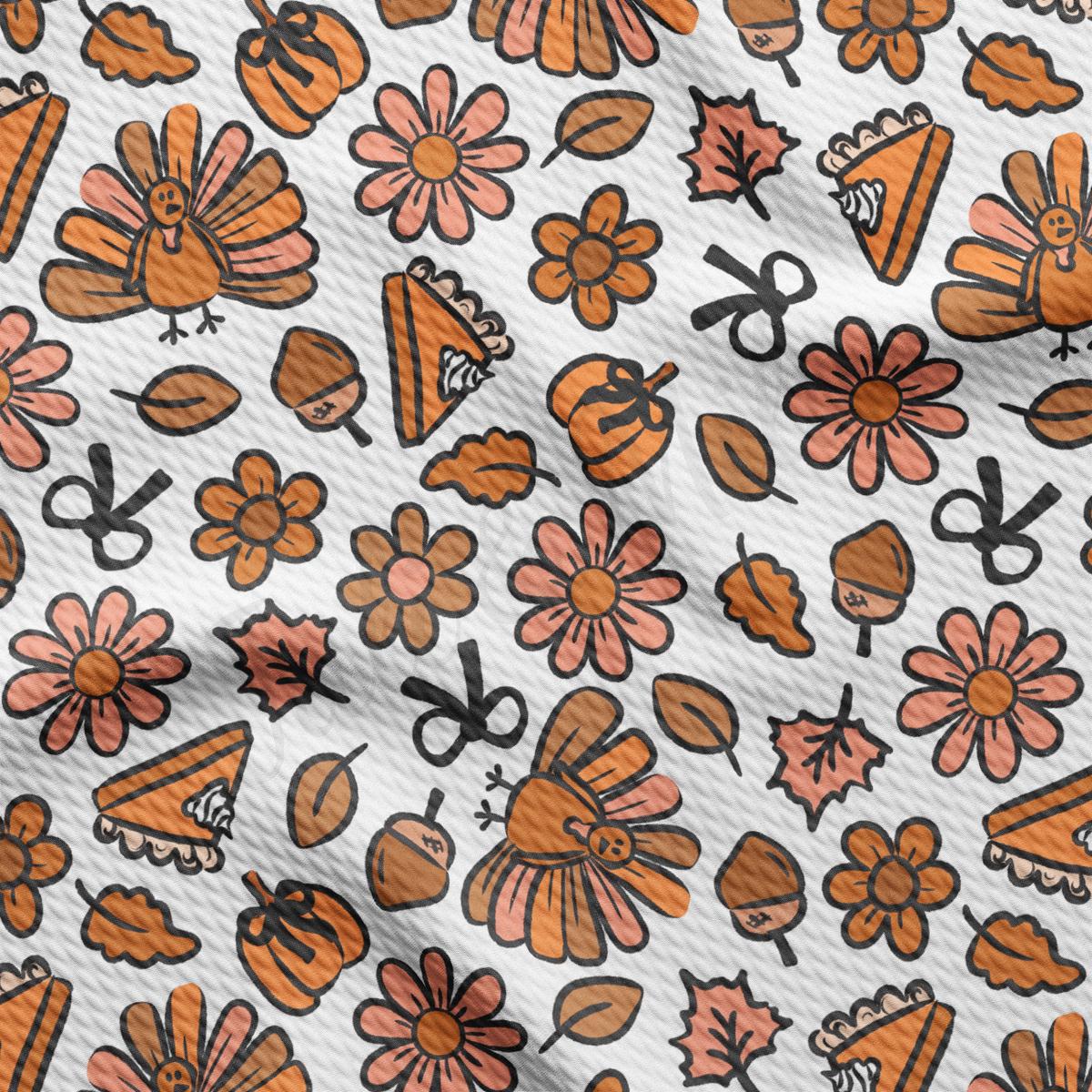 a close up of a pattern of flowers and scissors