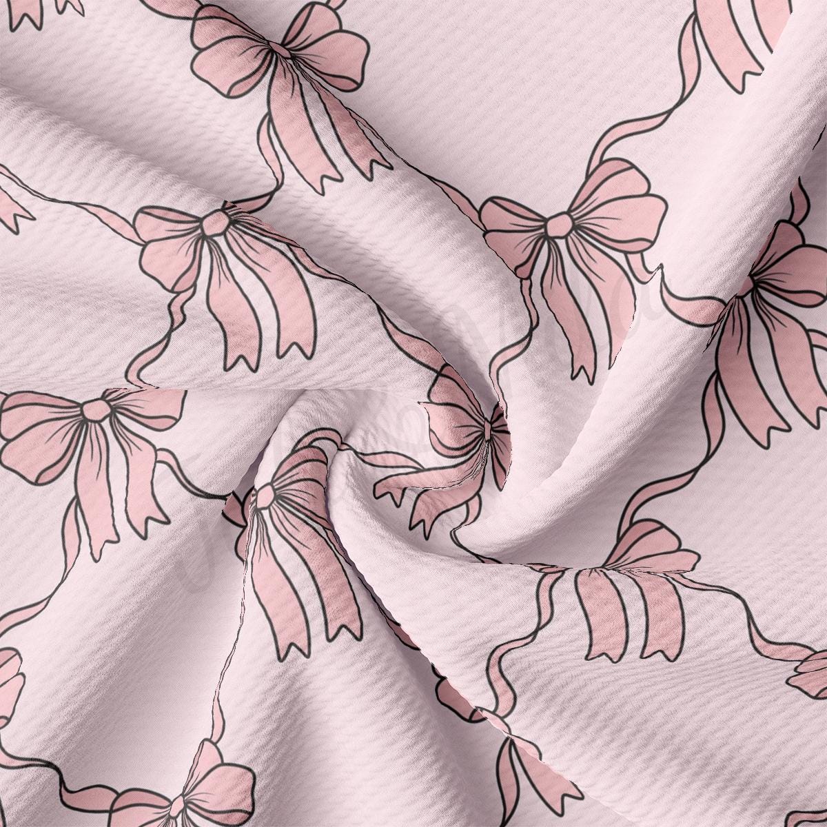a close up of a pink flowered fabric