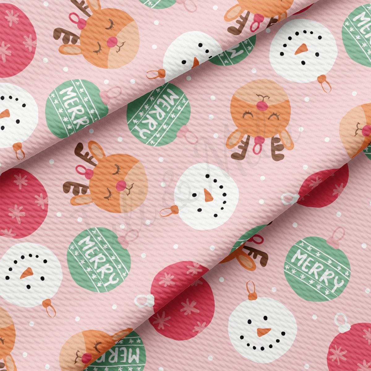 a pink fabric with a christmas pattern on it