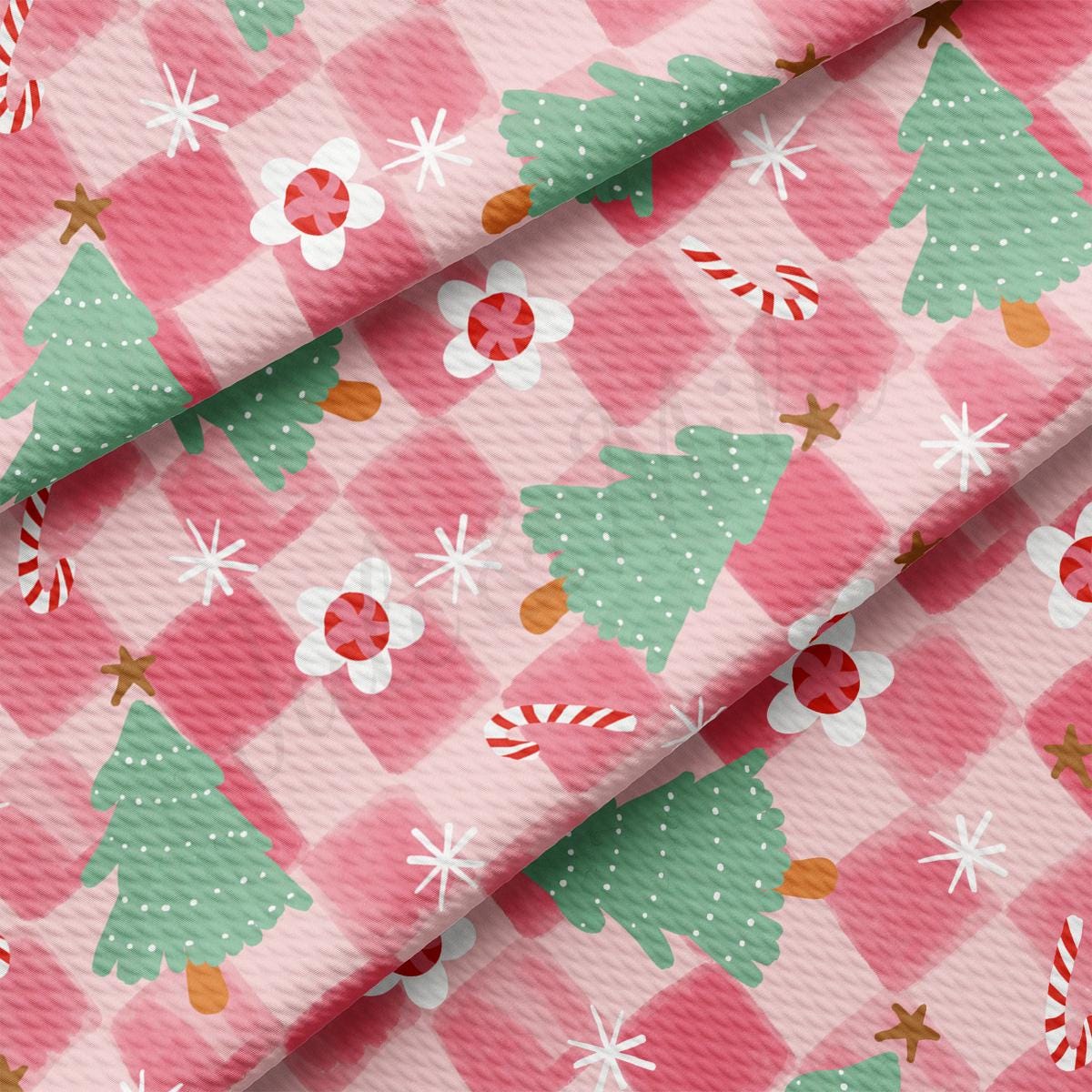 a pink background with christmas trees and candy canes