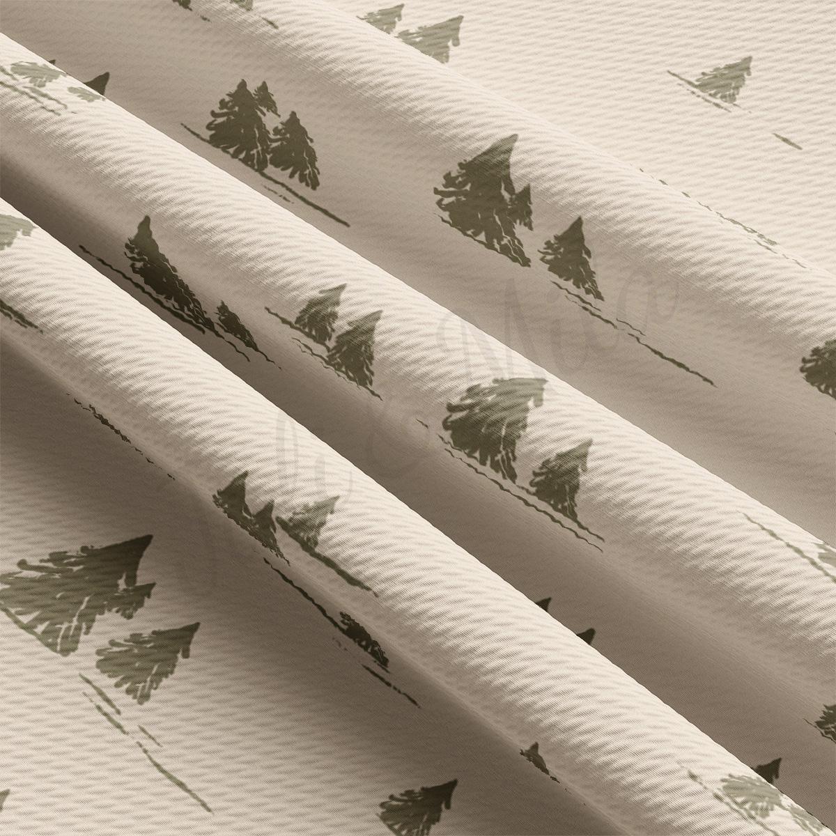 a close up of a white curtain with trees on it