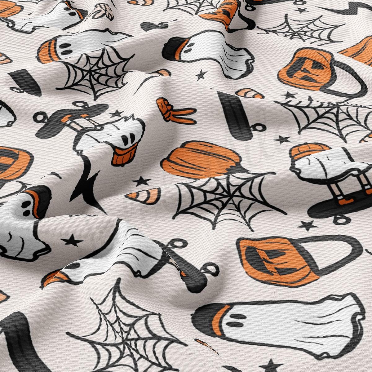 a close up of a pattern on a white fabric