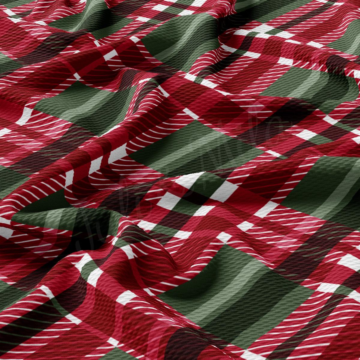 a close up of a red and green plaid fabric