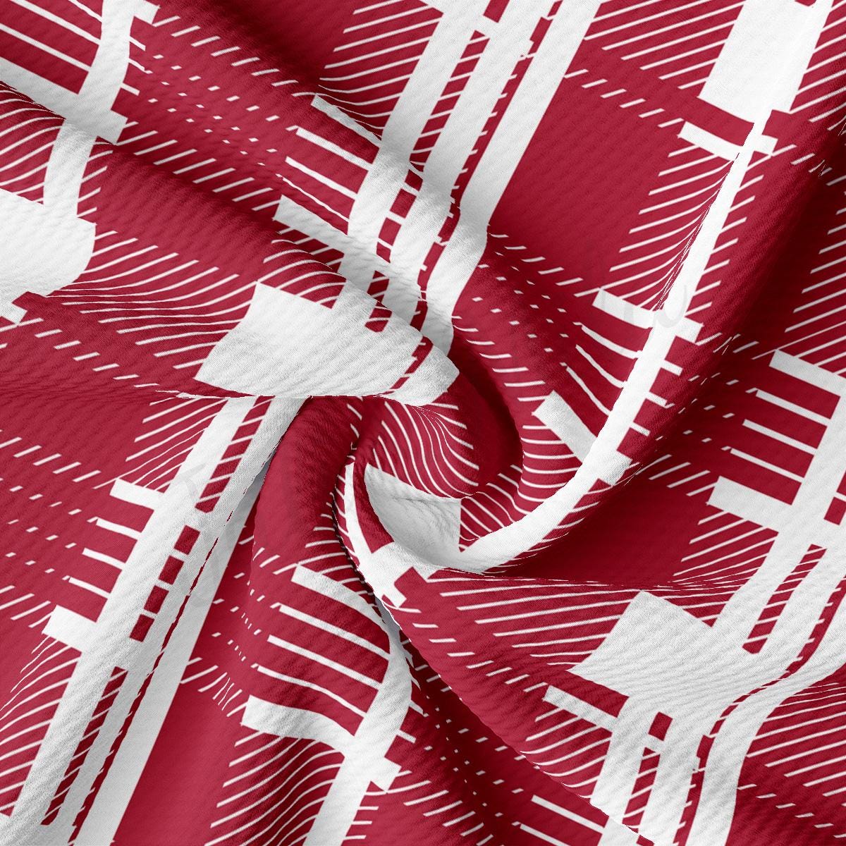 a close up of a red and white fabric