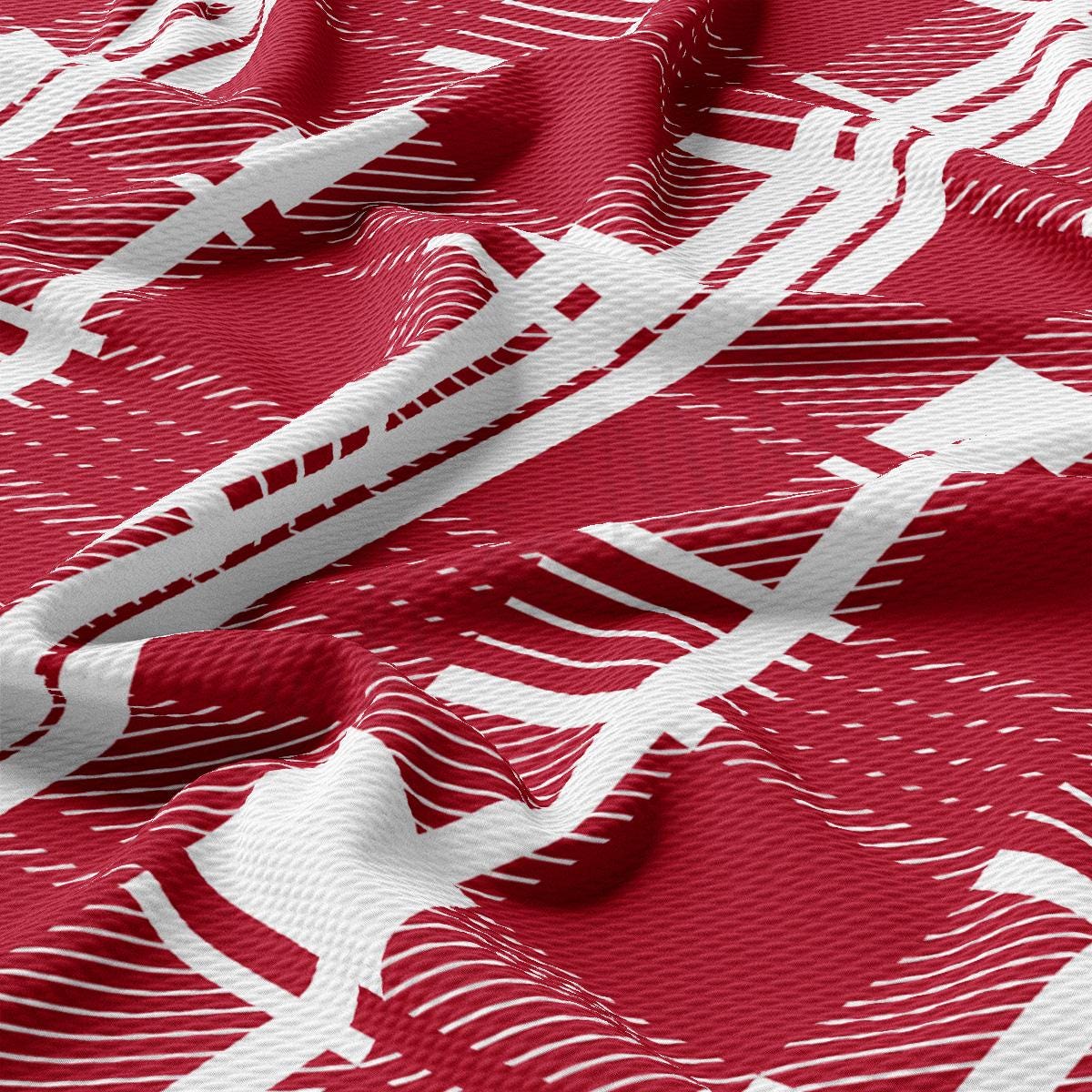 a close up of a red and white fabric