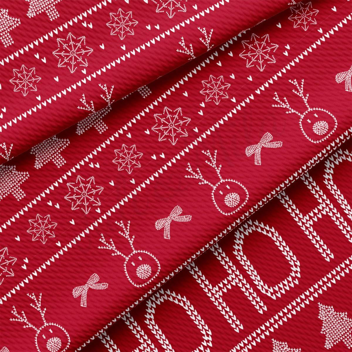 a close up of a red fabric with white snowflakes