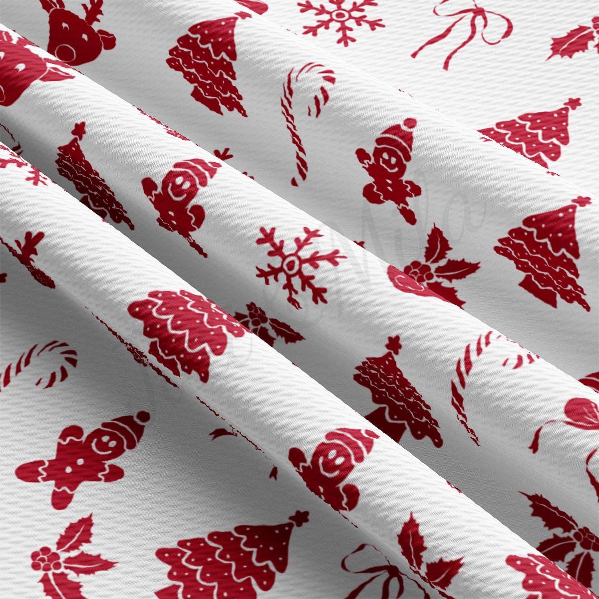 a red and white christmas tree pattern on a white background