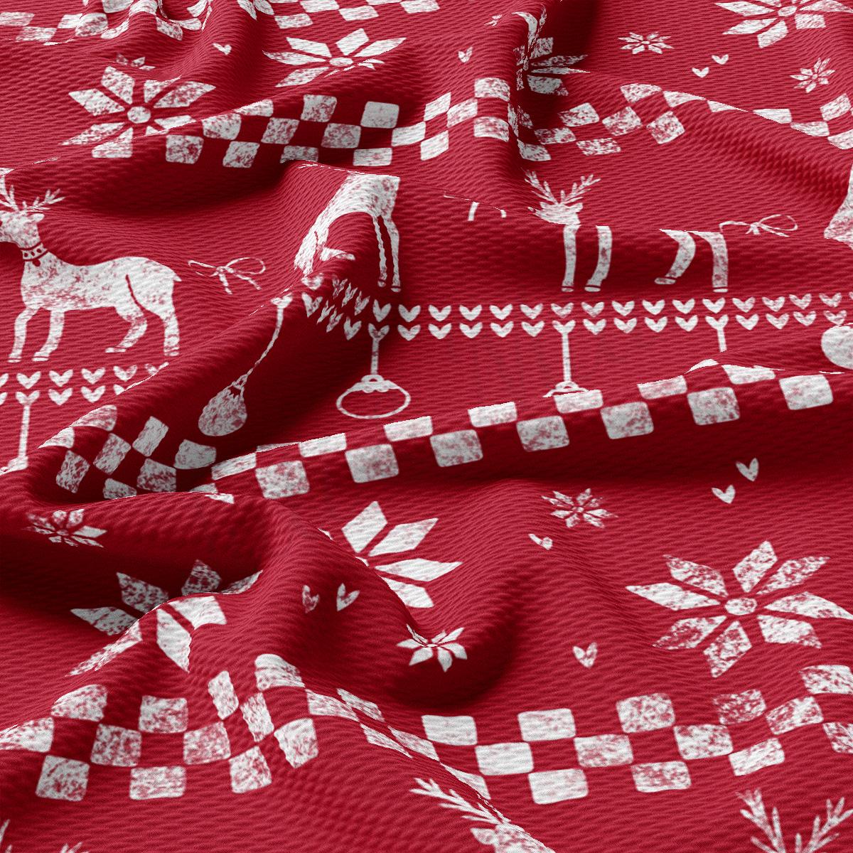 a red fabric with white snowflakes and reindeers