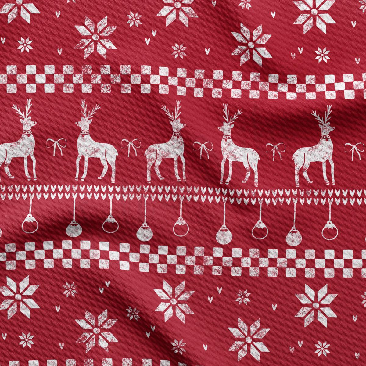 a red christmas sweater with white reindeers and snowflakes