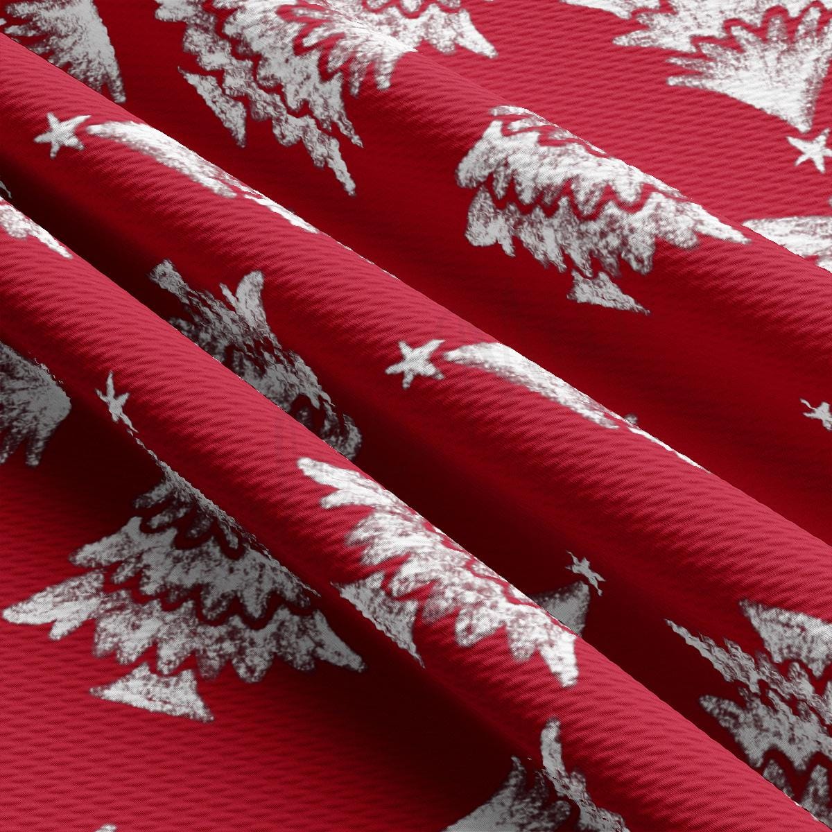 a close up of a red and white fabric