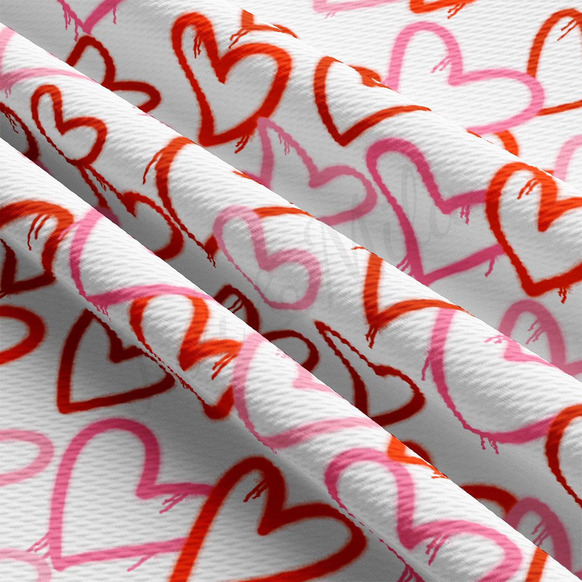 a close up of a pattern of hearts on a white background