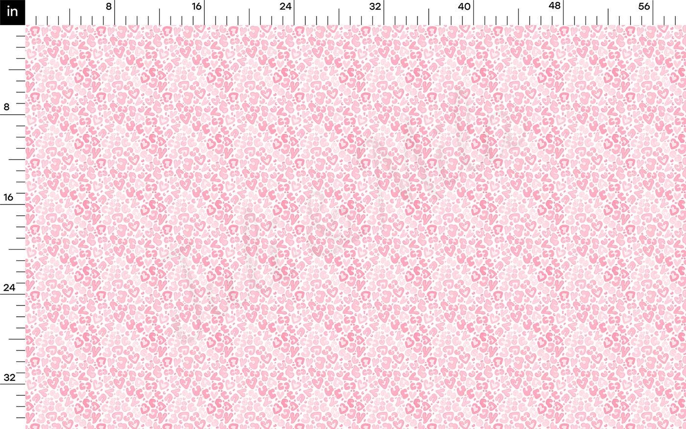 a ruler with a pink flower pattern on it