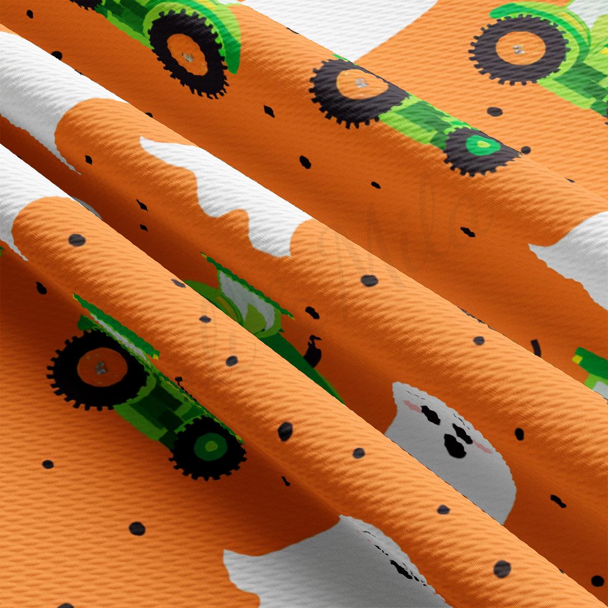 a close up of a pattern of orange and green tractors