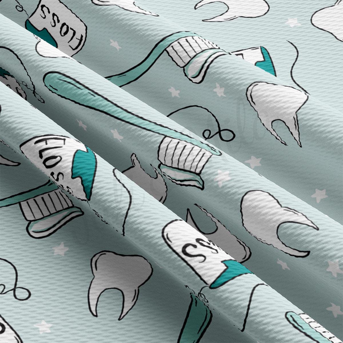 toothbrushes and toothpaste on a blue background