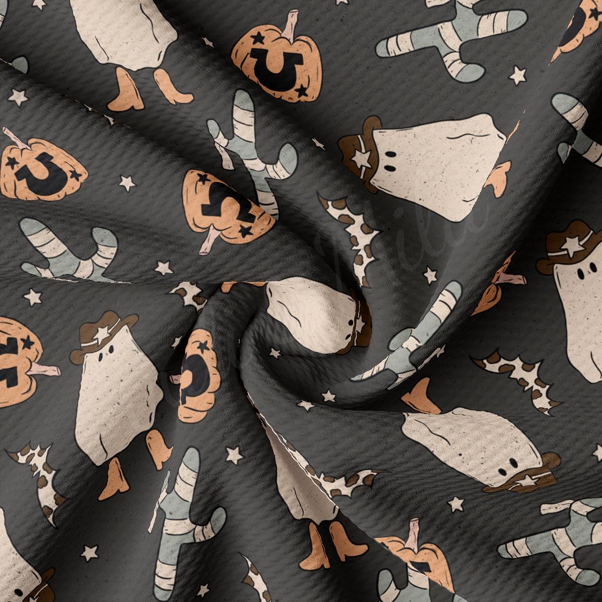 a fabric with a pattern of snowmen and pumpkins