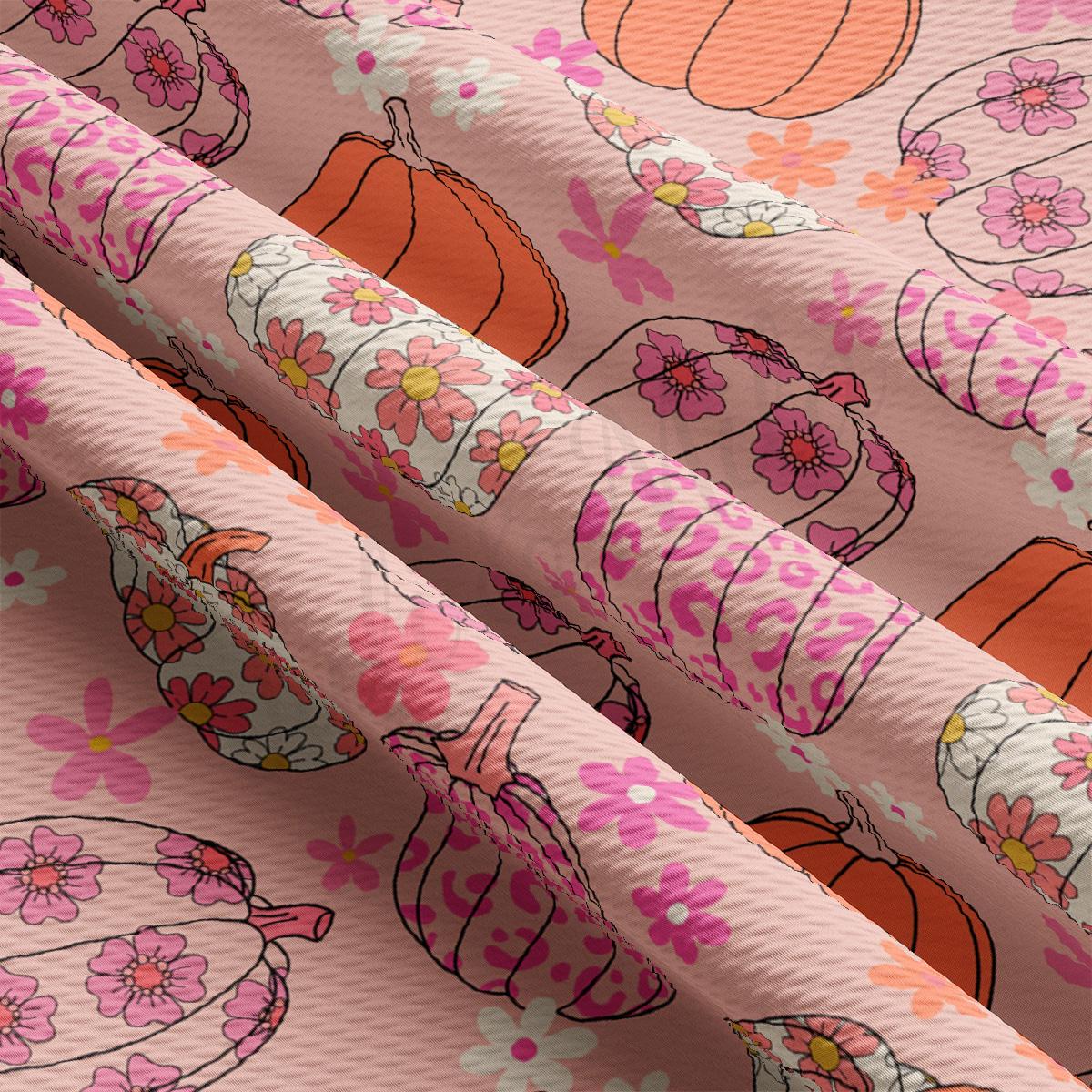 a close up of a pattern on a pink background