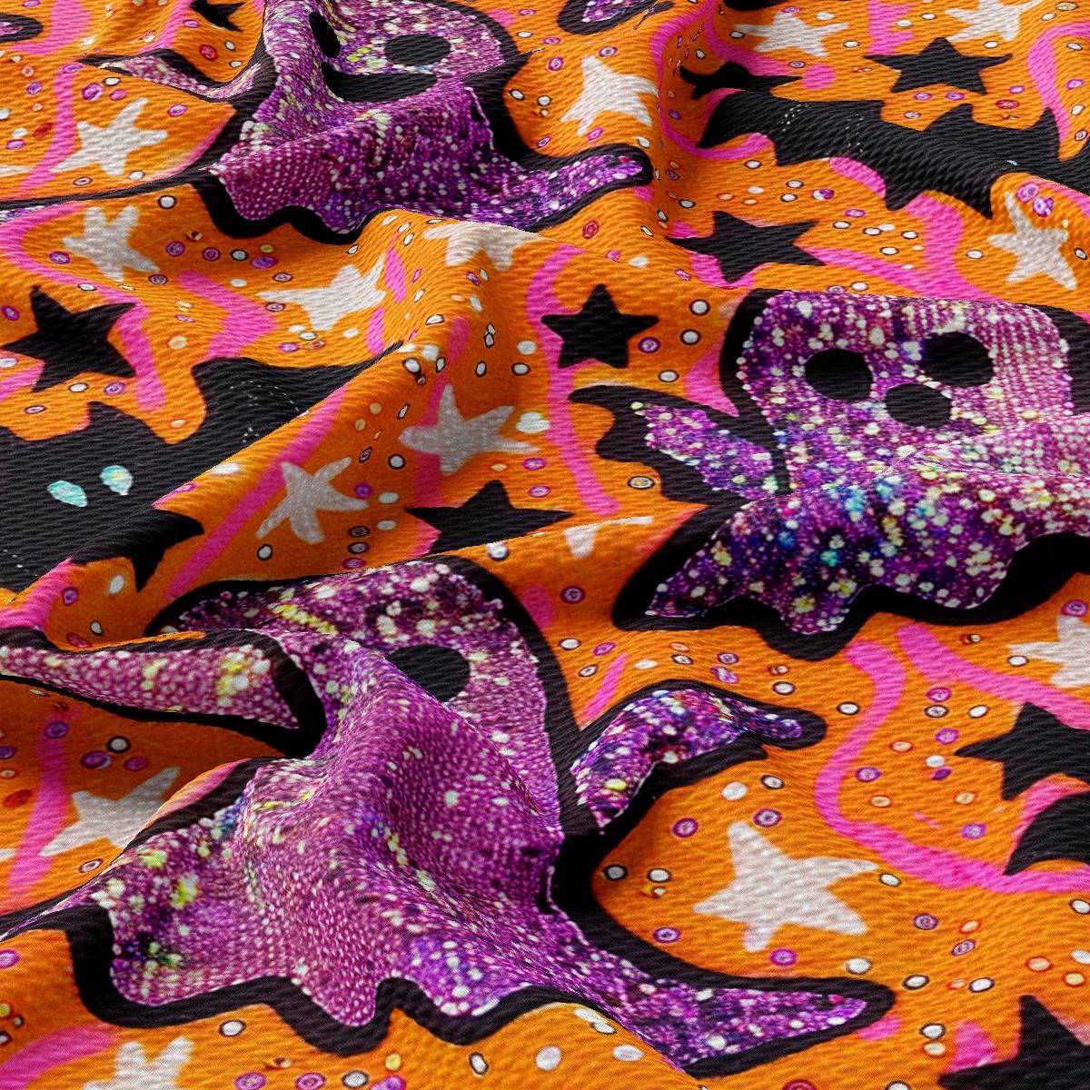 a close up of a fabric with a pattern of skulls and stars