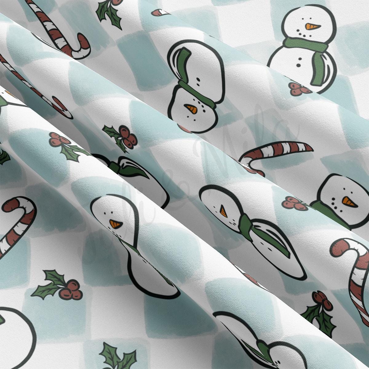 a close up of a pattern of snowmen