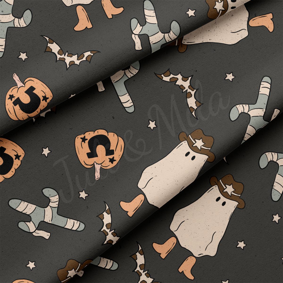 a pattern of halloween items on a black background