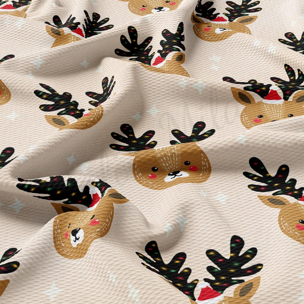 a close up of a fabric with reindeers on it