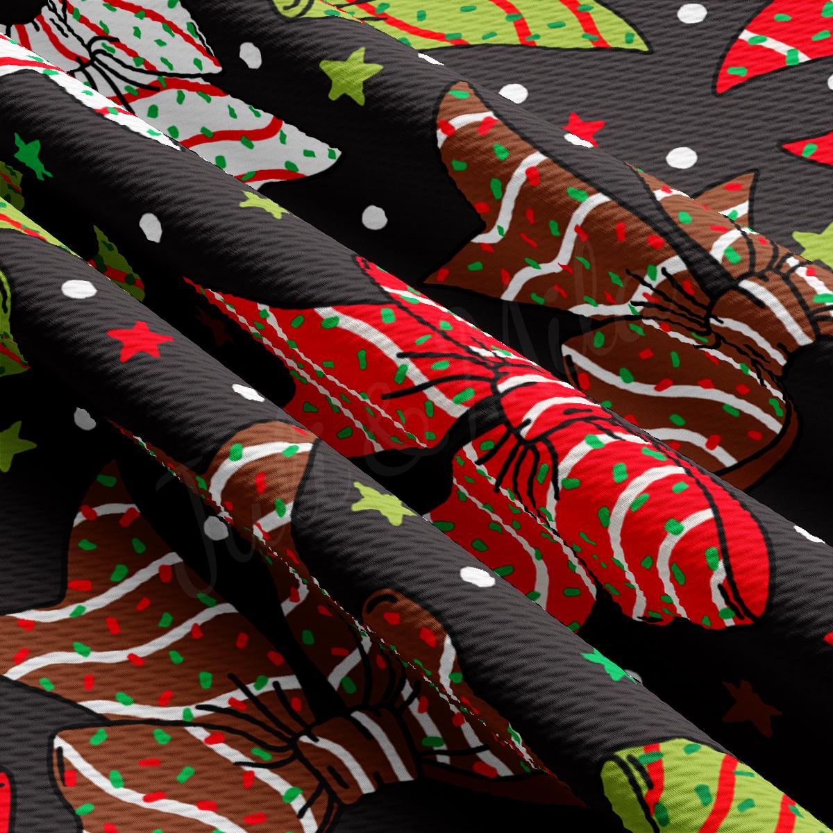 a close up of a tie with christmas decorations on it