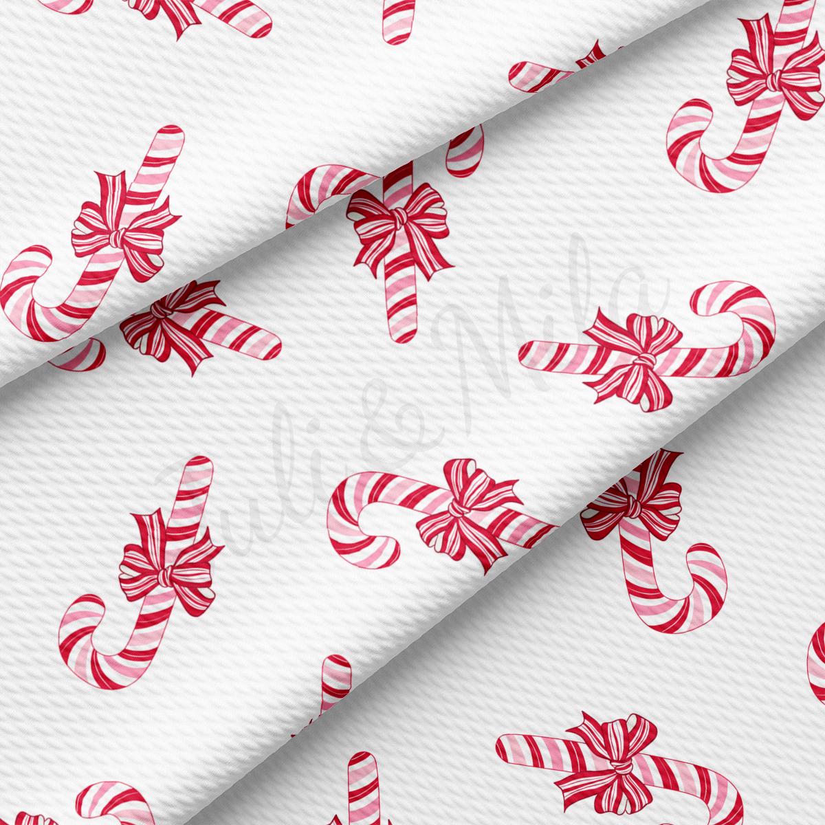 a white background with red and white candy canes