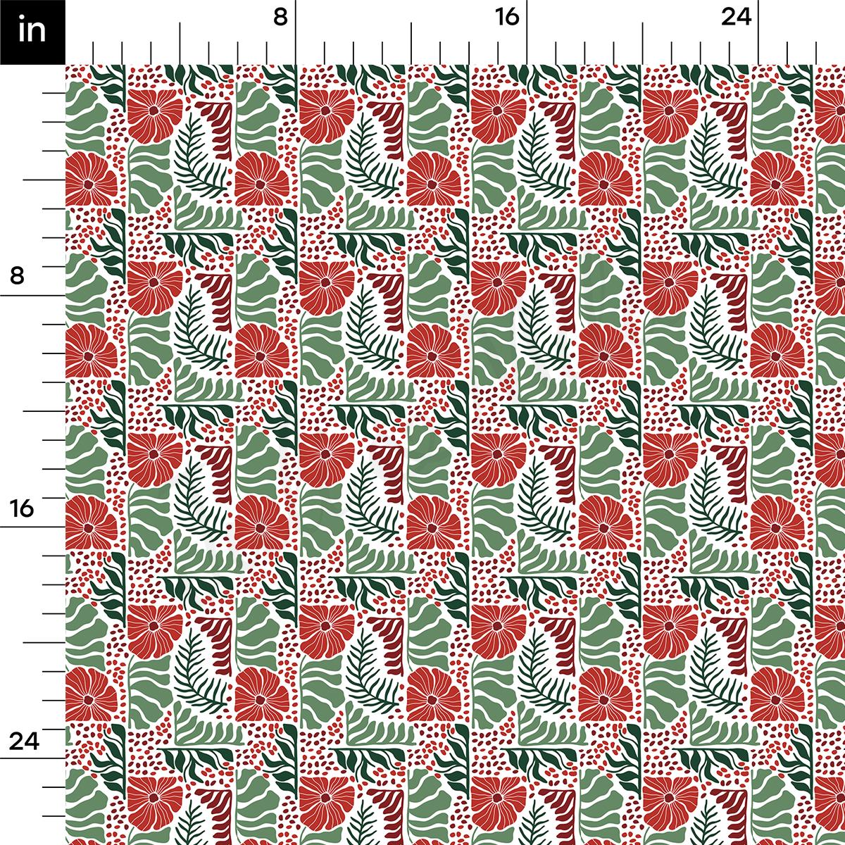 a red and green floral pattern on a ruler