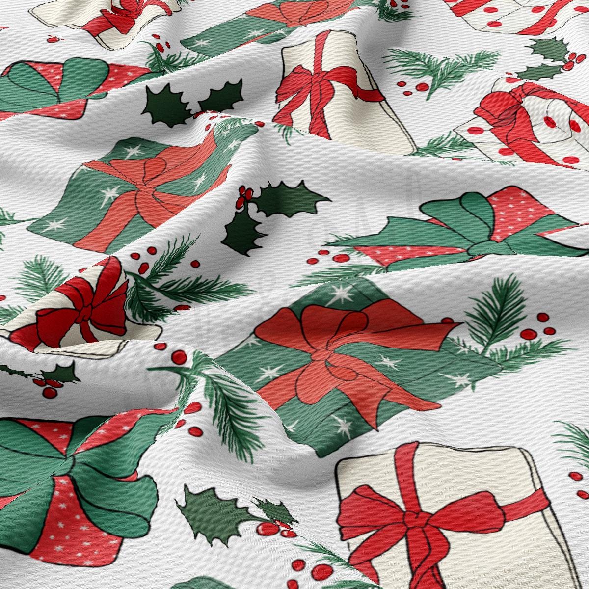 a close up of a white fabric with christmas decorations on it