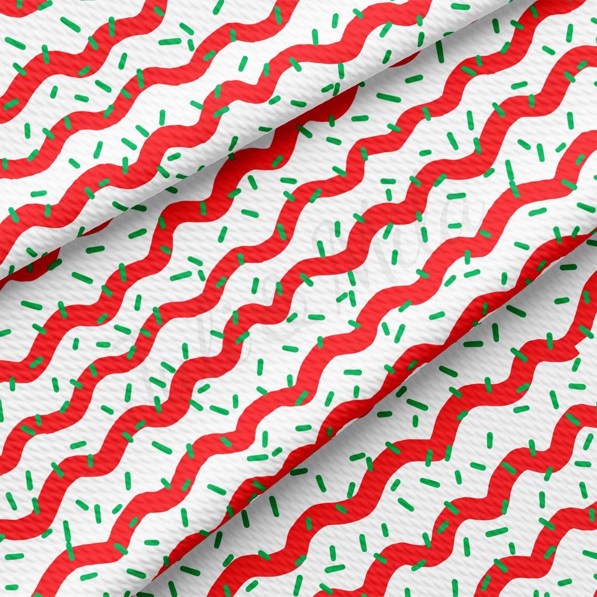 a red and white background with green sprinkles
