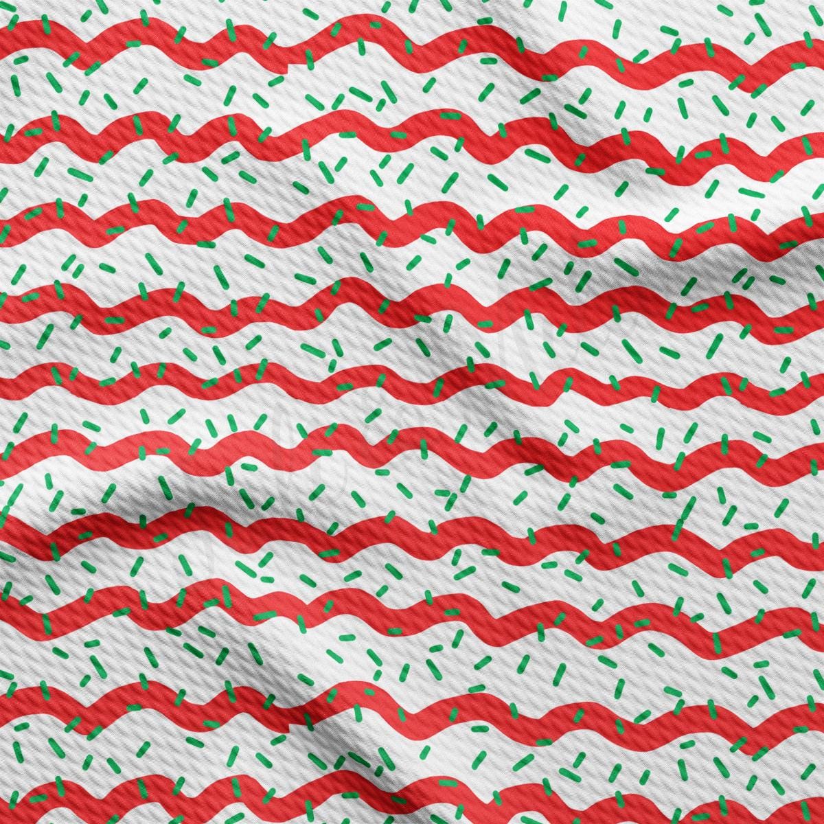 a red and white background with green sprinkles