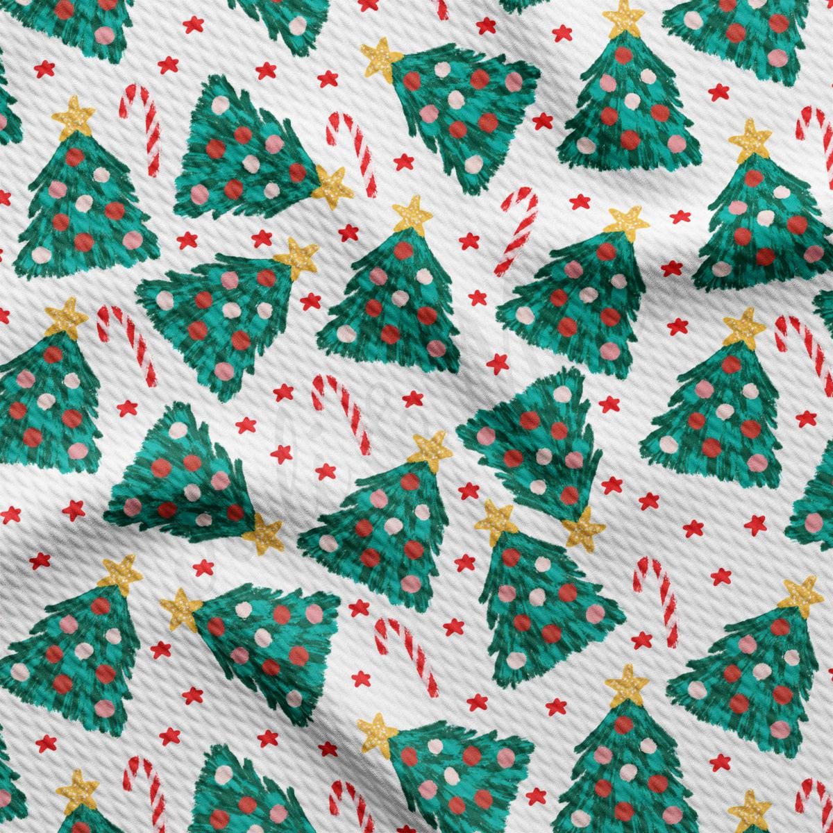 a pattern of christmas trees on a white background