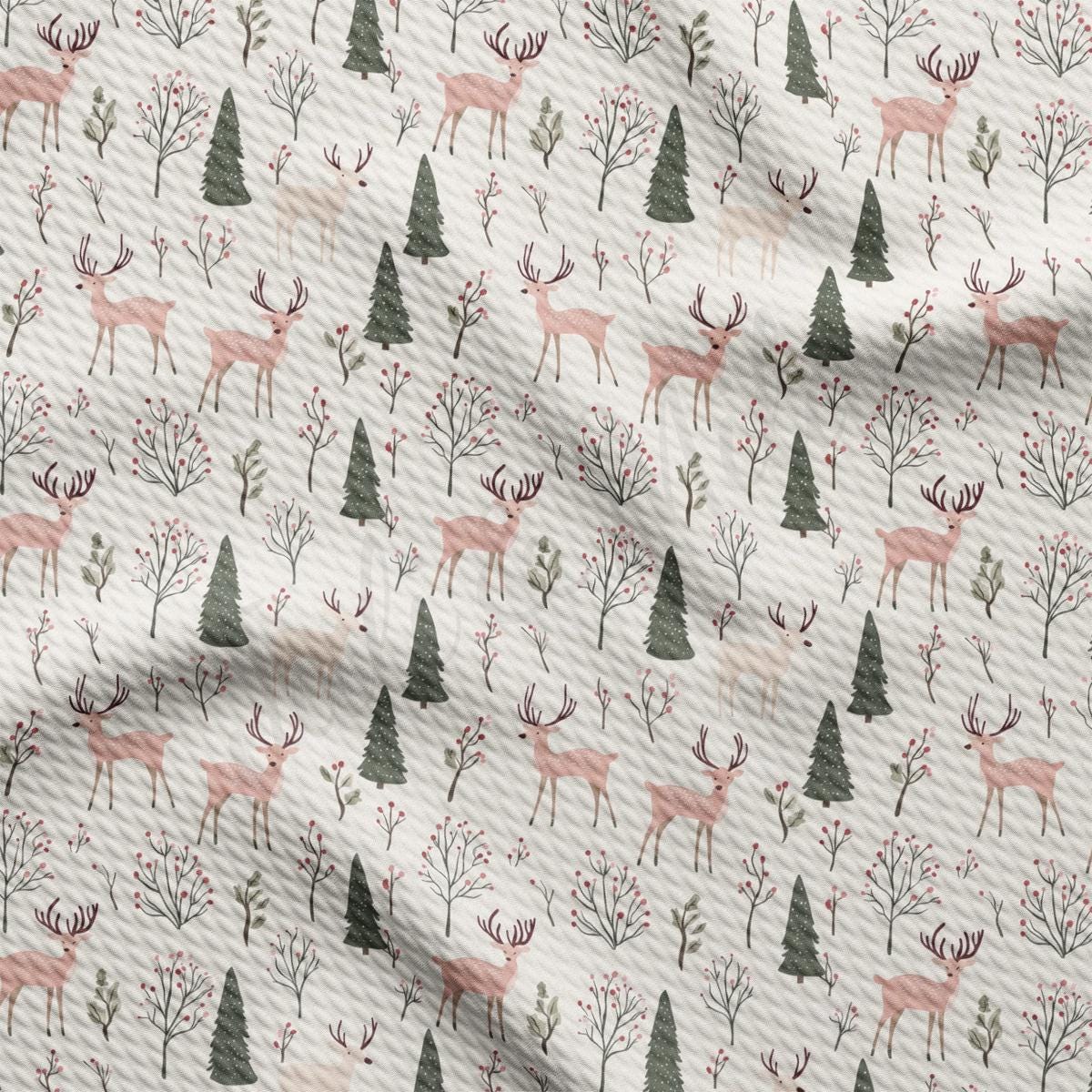 a pattern of deer and trees on a white background