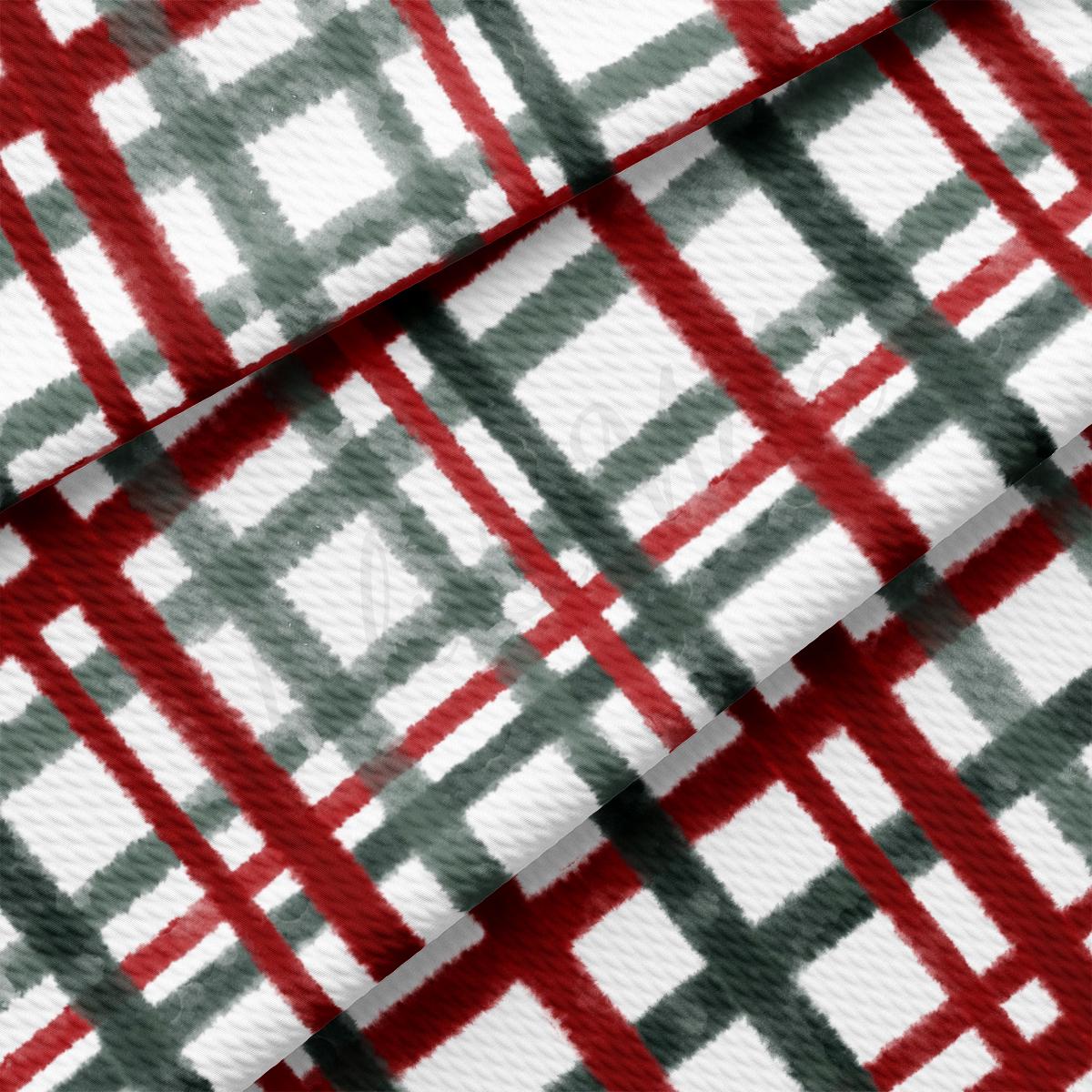 a red and green plaid fabric with a white background