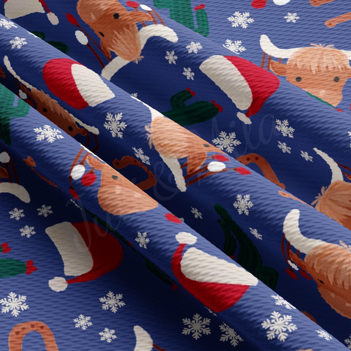 a blue wrapping paper with a pattern of dogs and santa hats