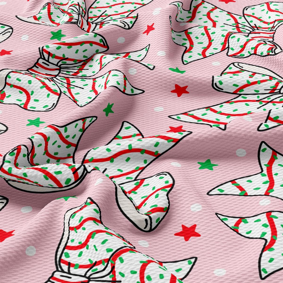 a pink background with red, green and white bows and stars