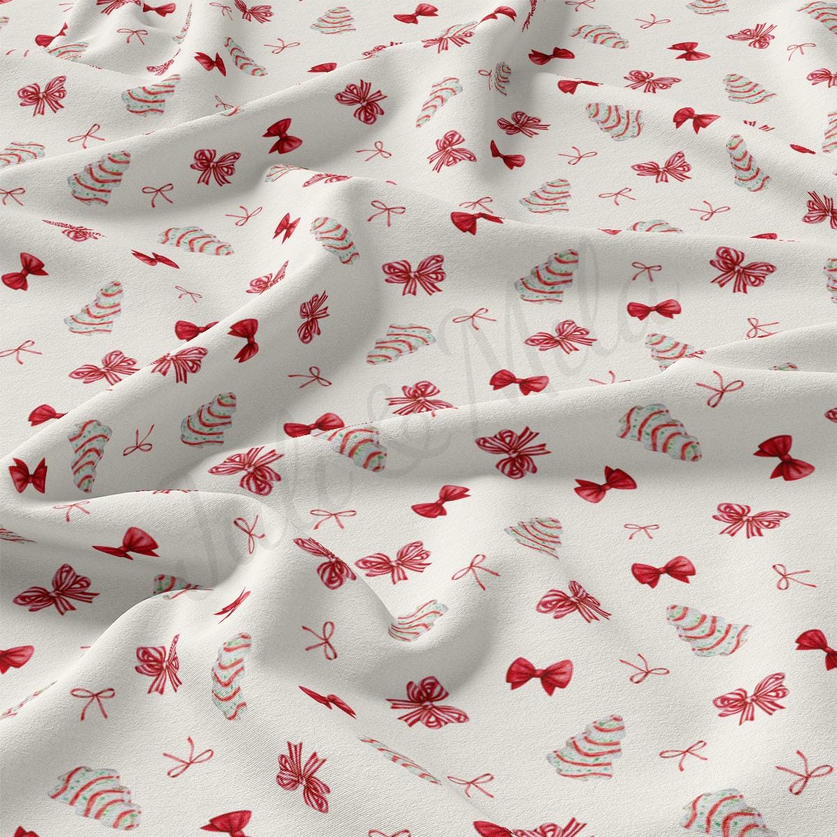 a close up of a white fabric with red flowers on it