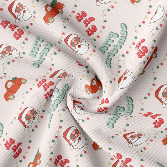 a white fabric with a santa clause pattern