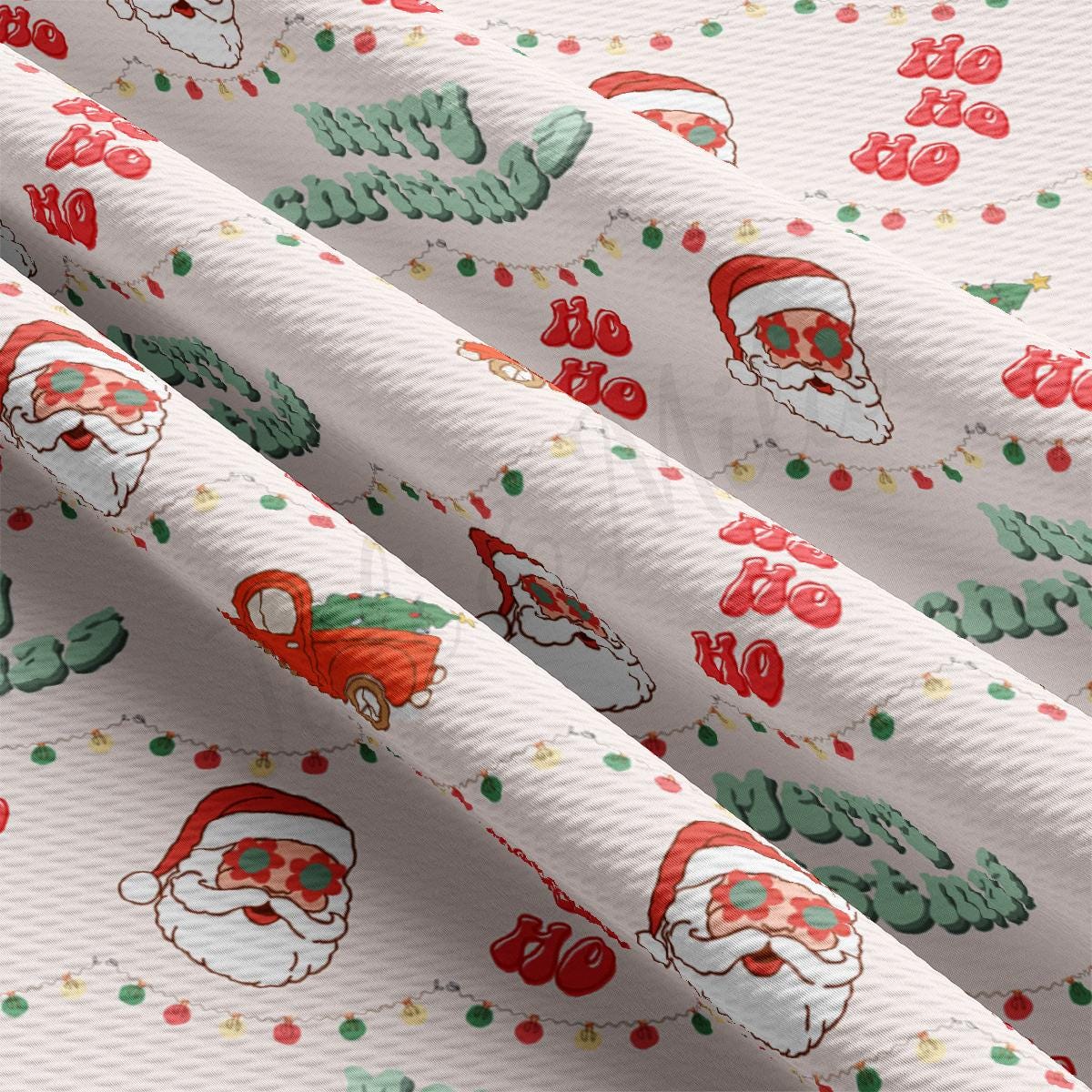 a white wrapping paper with santa claus and christmas trees on it