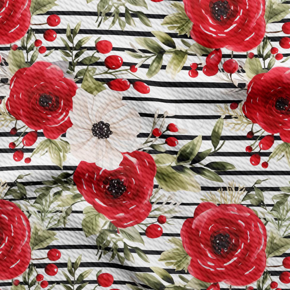 a red and white flower on a black and white striped background