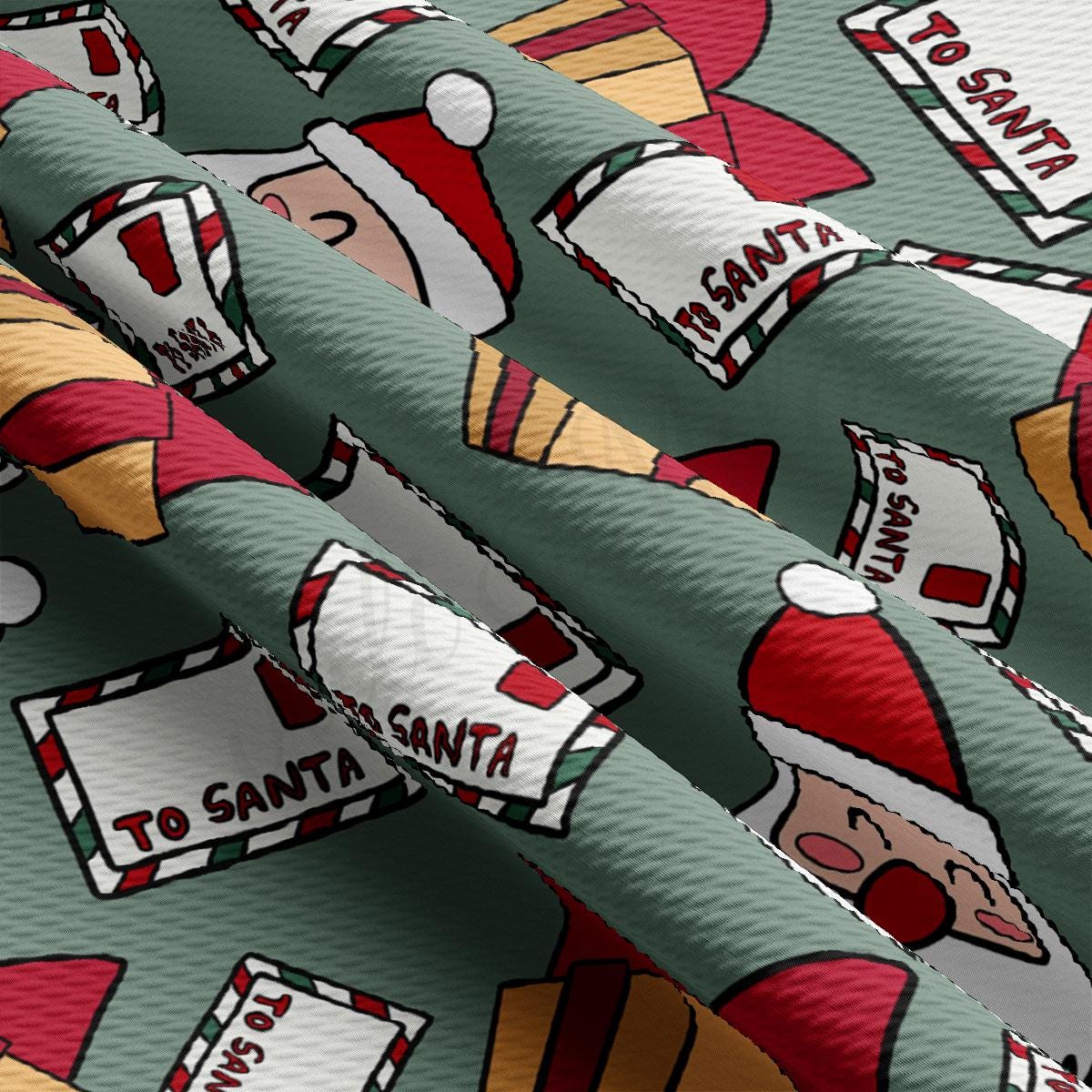 a green wrapping paper with santa claus on it