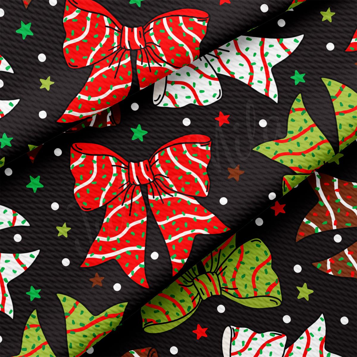 a black background with red, green and white bows