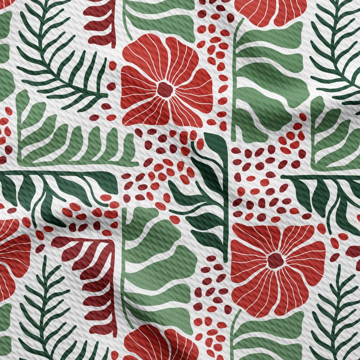 a red and green flower pattern on a white background