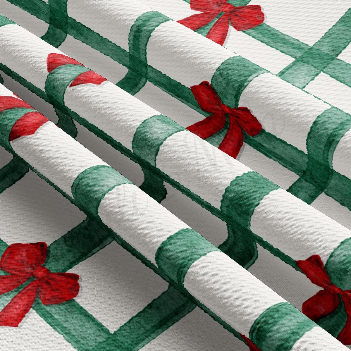 a close up of a wrapping paper with bows on it