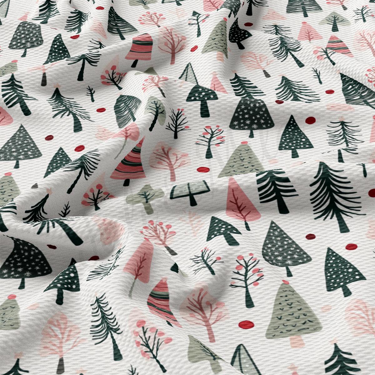 a close up of a white fabric with trees on it