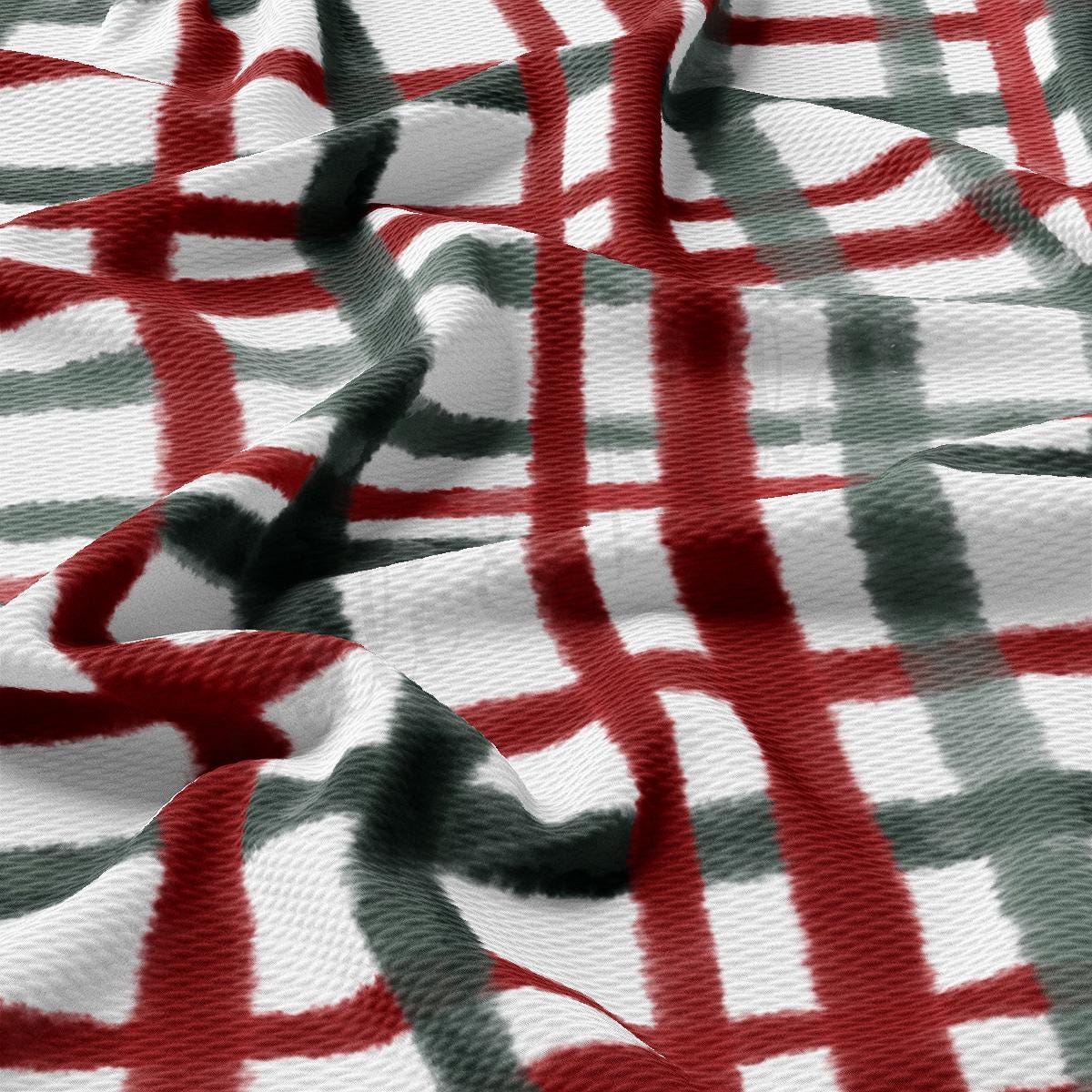 a red and white checkered fabric with a black and white design